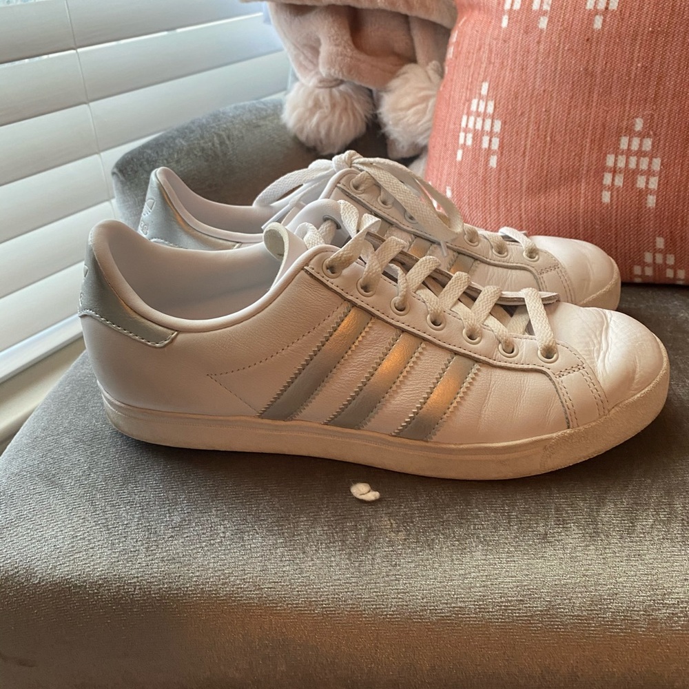 White adidas with silver stripes